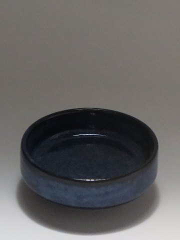 163210